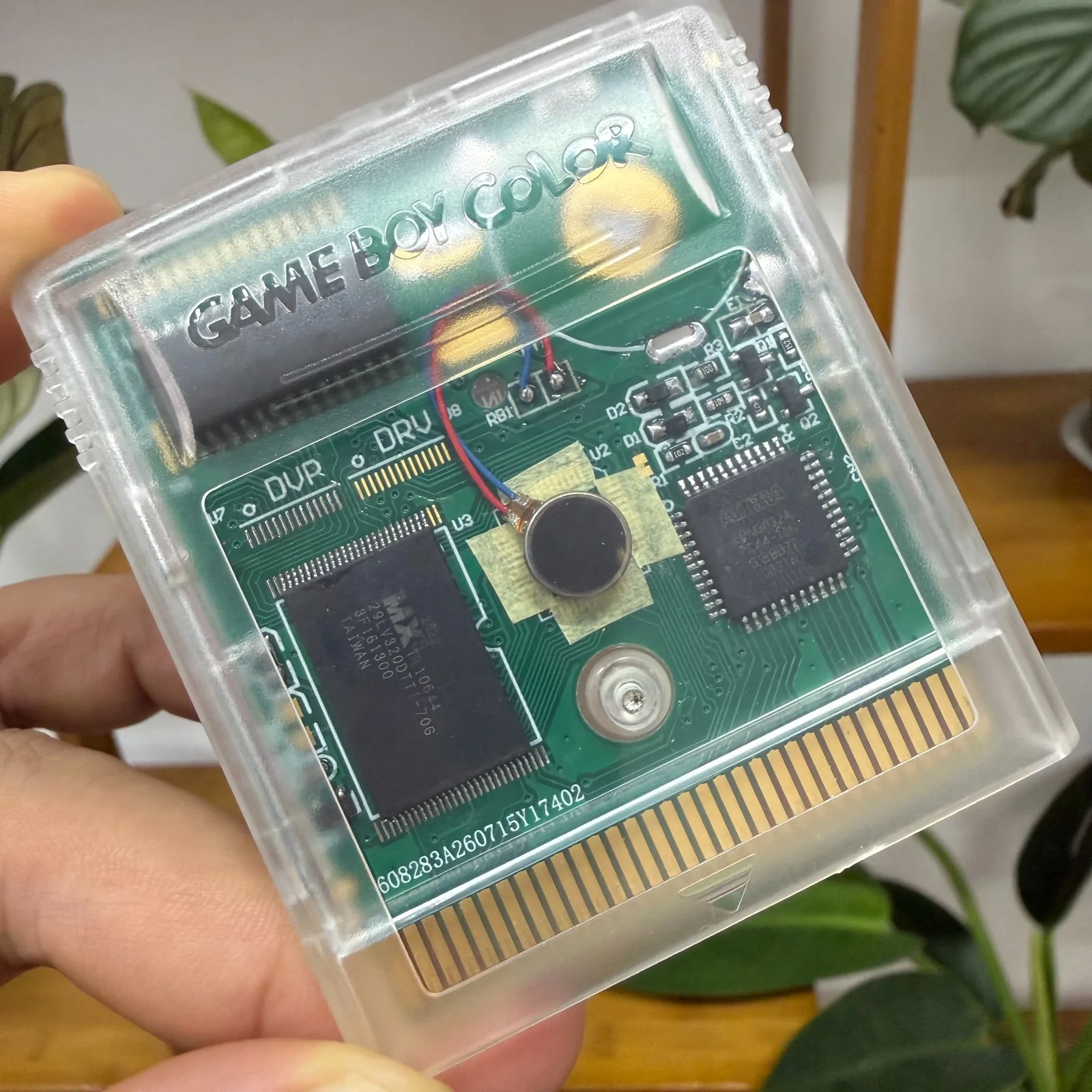 Original product photograph of transparent cartridge housing and its circuit board
